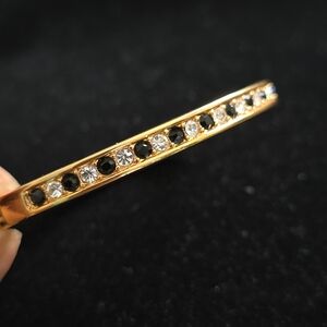 Vintage Gold tone Bangle Bracelet with Clear and Black stones signed by ROMA